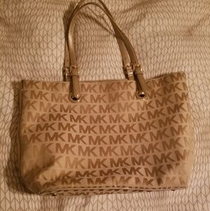 Tan and gold michael kors purse